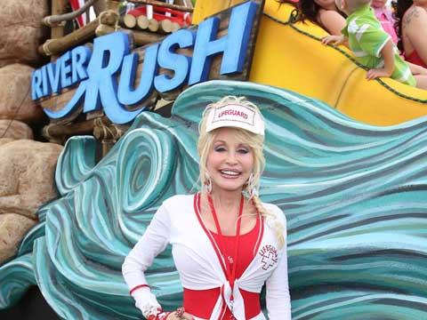 Dolly rides on RiverRush float